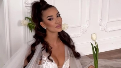 Мадлен удивила поклонников, устроив фотосессию в свадебном платье (видео)